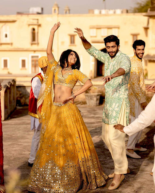 Graceful Yellow Georgette Mirror Work Lehenga Choli