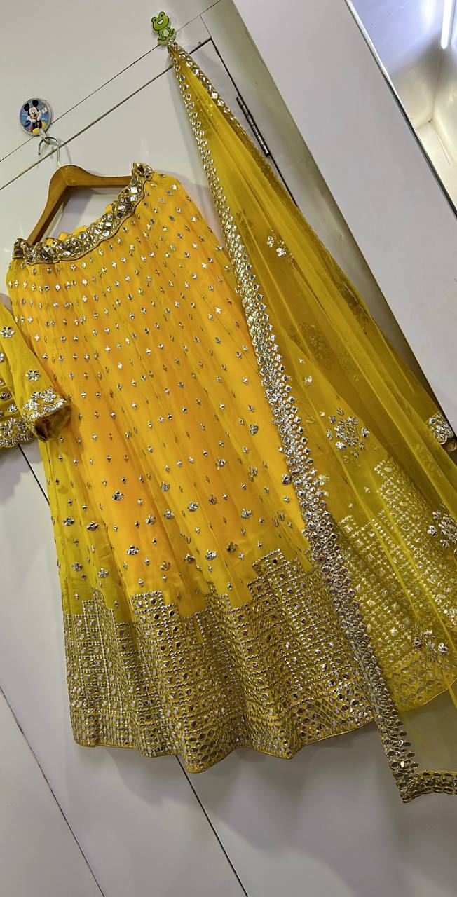 Graceful Yellow Georgette Mirror Work Lehenga Choli