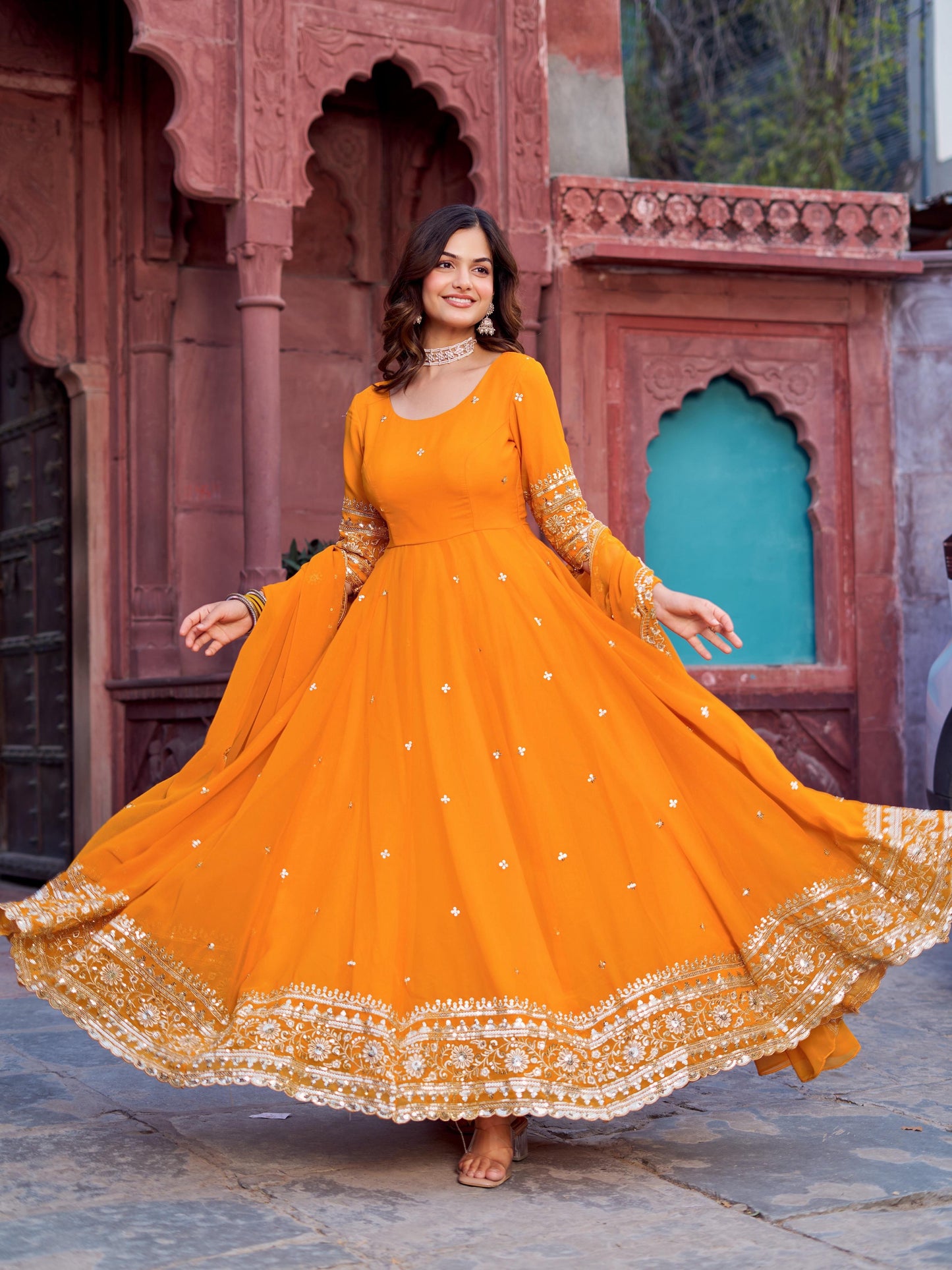 Outstanding Yellow Color Georgette Gown With Dupatta