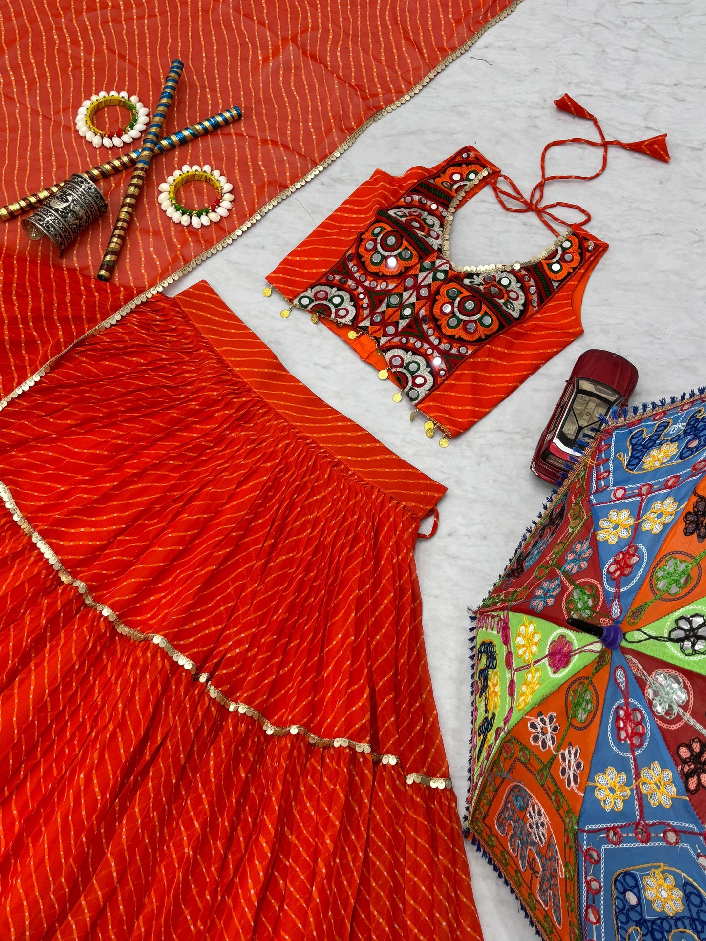 Ravishing Orange Georgette Print Work Lehenga Choli