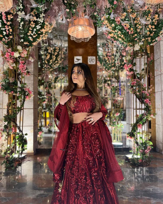 Beautiful Embellished Sequence Work Maroon Net Lehenga Choli
