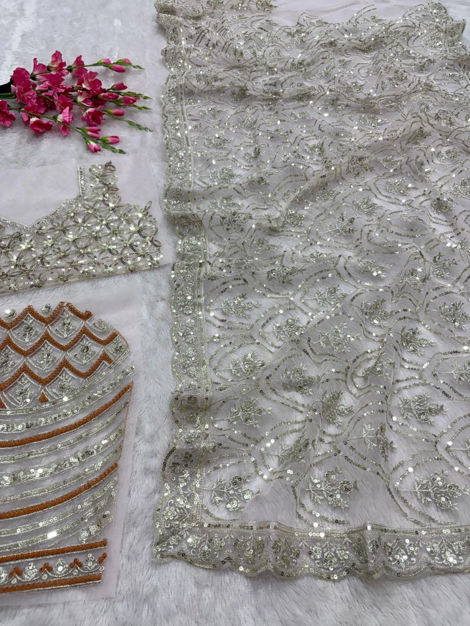 Flattering Heavy Sequins Work White Color Net Saree