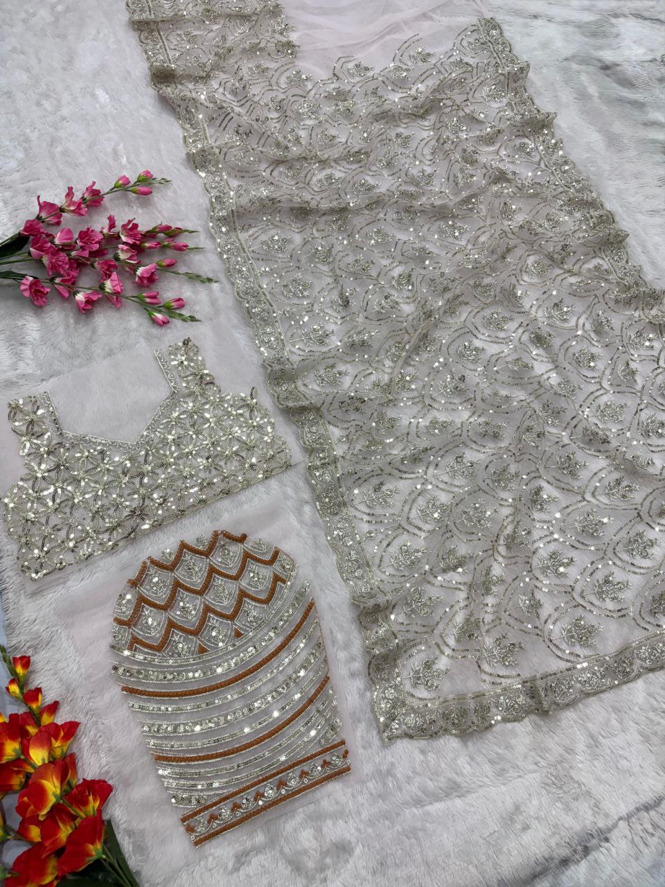 Flattering Heavy Sequins Work White Color Net Saree
