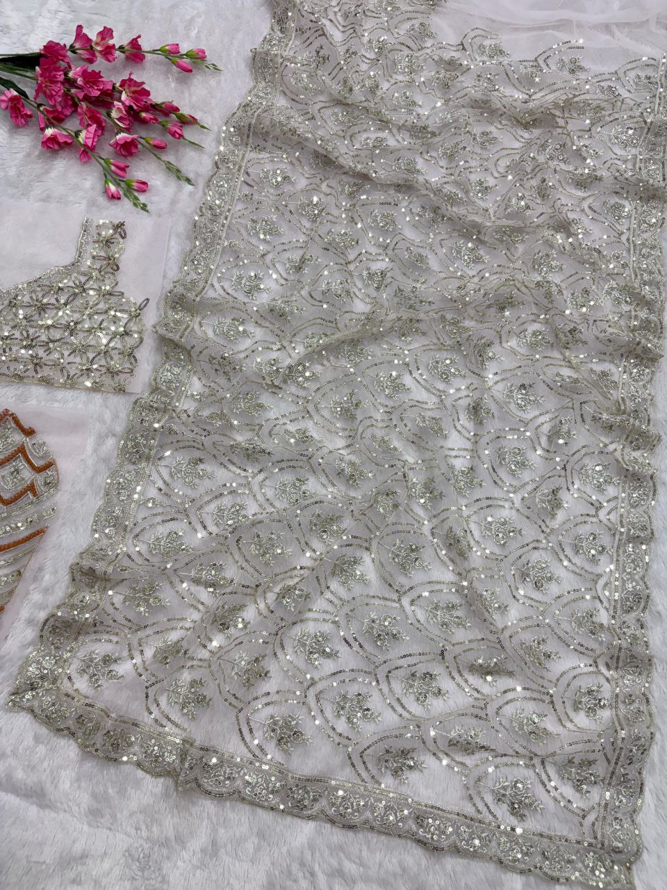 Flattering Heavy Sequins Work White Color Net Saree