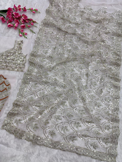 Flattering Heavy Sequins Work White Color Net Saree