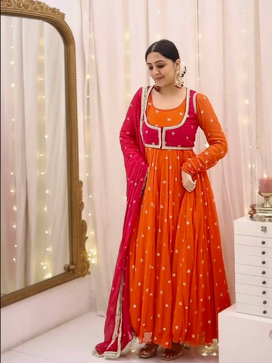 Attractive Orange Color Embroidered Gown With Koti