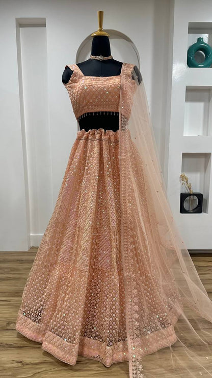 Marvelous Peach Net Rainbow Work Lehenga Choli