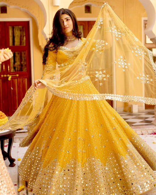Graceful Yellow Georgette Mirror Work Lehenga Choli