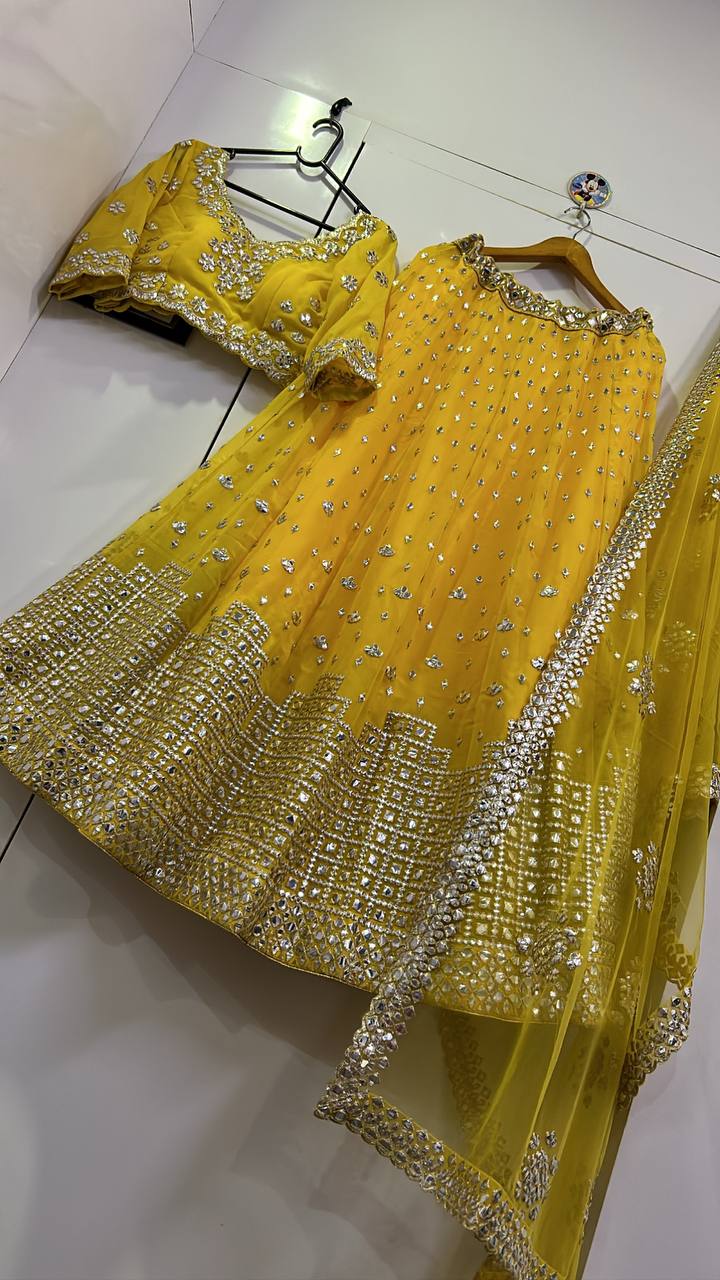 Graceful Yellow Georgette Mirror Work Lehenga Choli