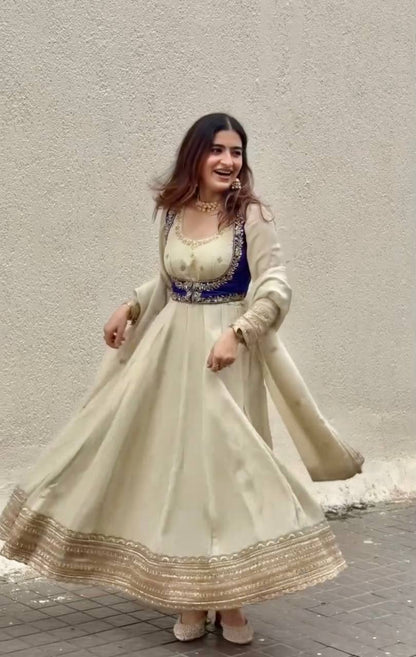 Elegant Cream Color Embroidery Work Gown With Koti