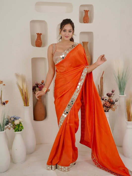 Celerity Look Orange Silk Mirror Border Saree